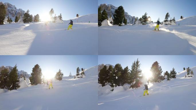 滑雪者在野外滑雪白雪冬季阳光休闲娱乐单板