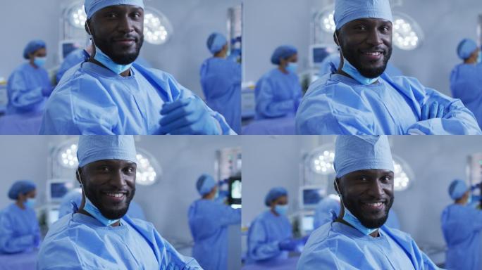 男外科医生站在手术室对着摄像机微笑