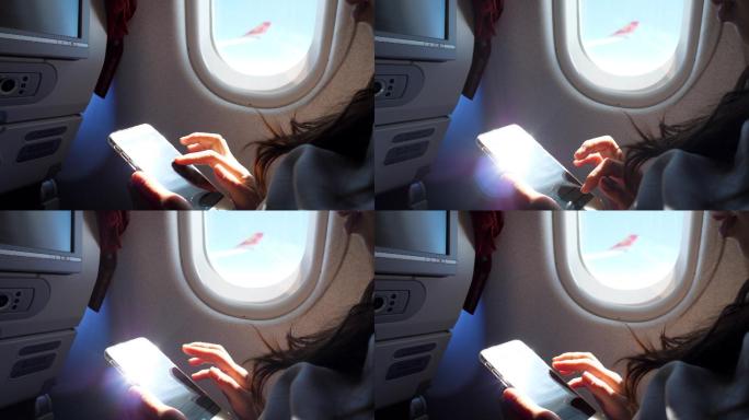 飞机上的乘客使用手机