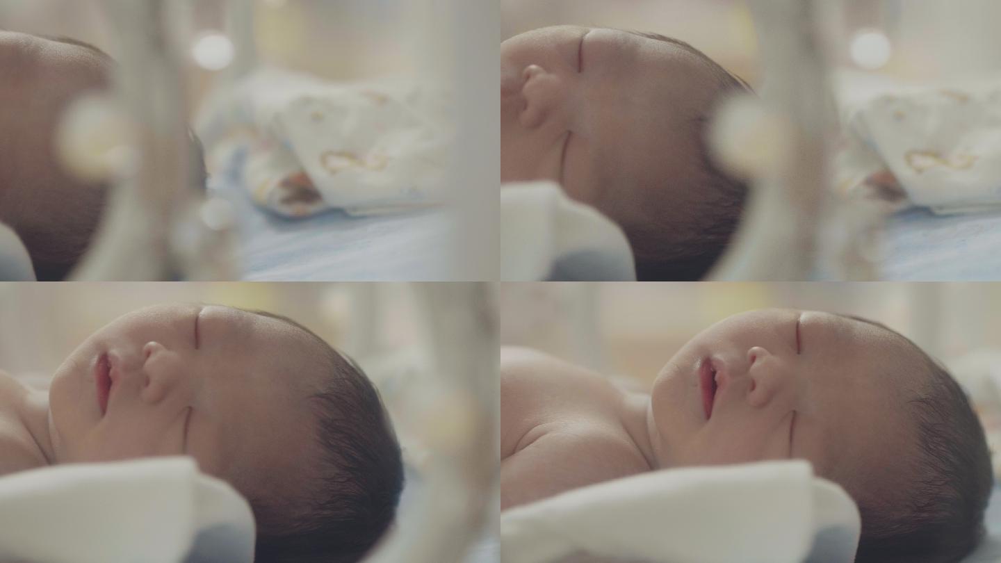新生儿特写镜头婴儿育婴师保温箱观察室熟睡
