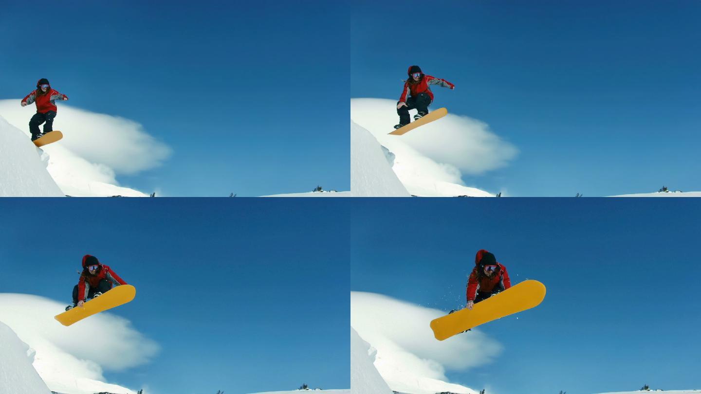 滑雪板运动员跳入天空，慢动作