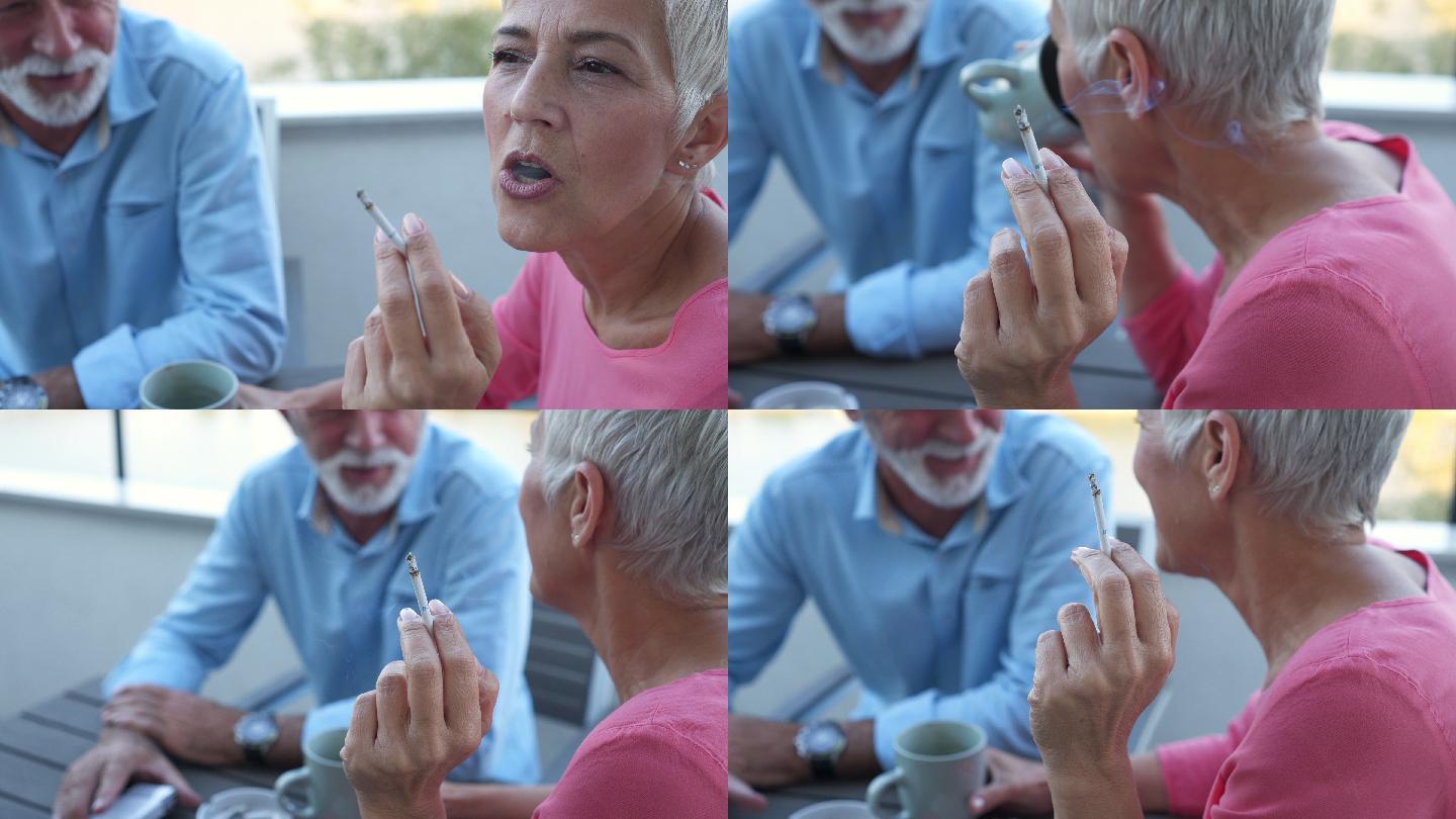 老年妇女与丈夫在户外休闲时吸烟