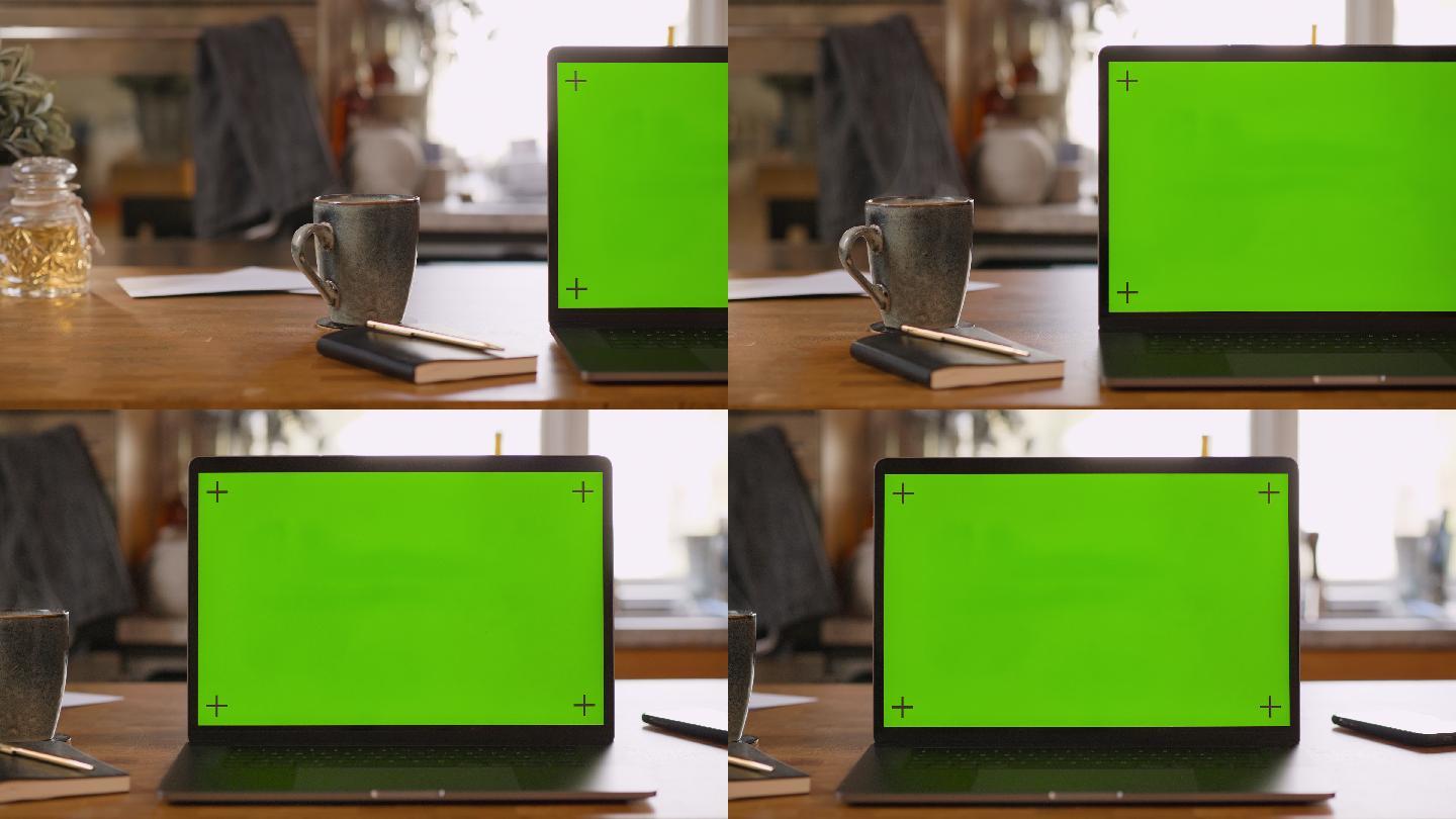 家中厨房的绿色屏幕笔记本电脑