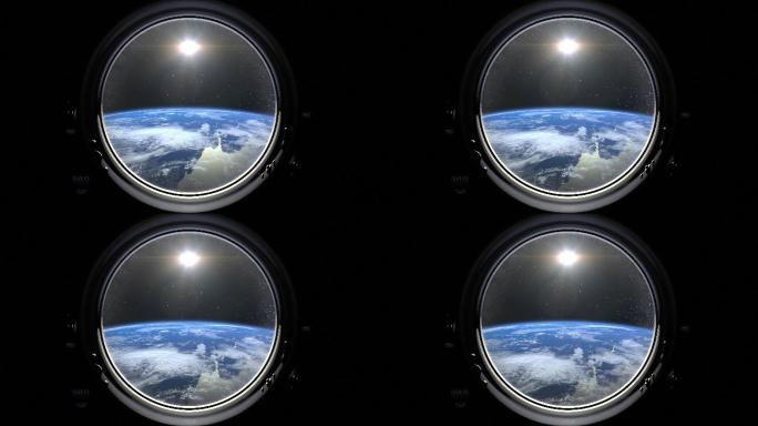 从太空船的舷窗看地球的景象