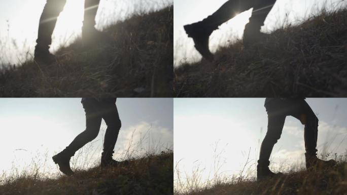 登山的人，登山脚步特写，追光者逆光登山