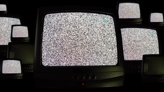 黑色背景上的多台复古电视