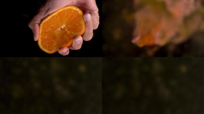 用手挤压橙子水果慢动作入水创意特写主图视