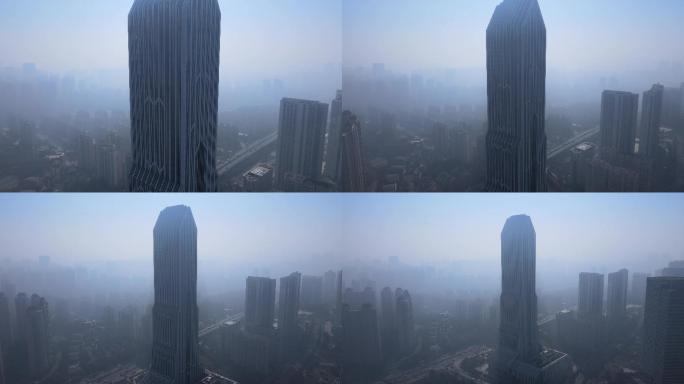 航拍雾霾中建筑后退镜头