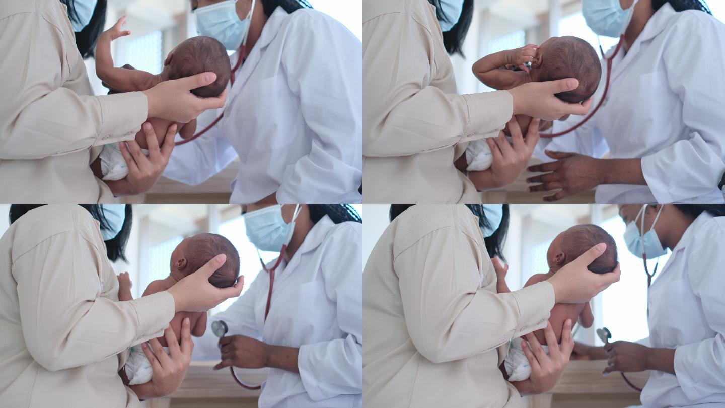 医生给新生儿检查婴儿产科产房