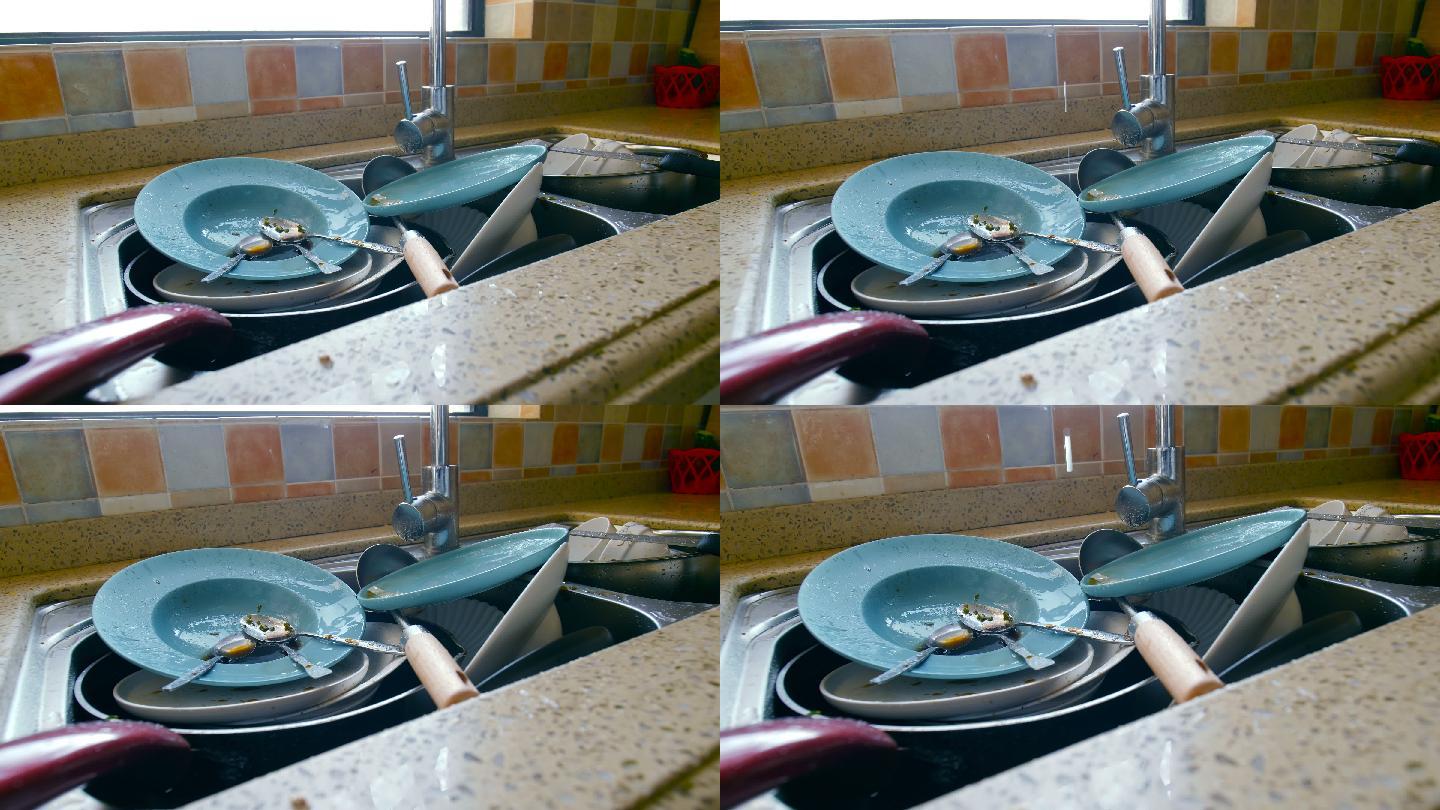 水槽里的脏盘子水家庭生活洗碗