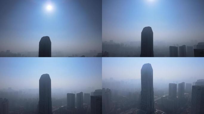 航拍雾霾天气大楼城市建筑下拉镜头视频素材