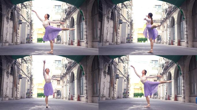 年轻漂亮的芭蕾舞演员在街上跳舞