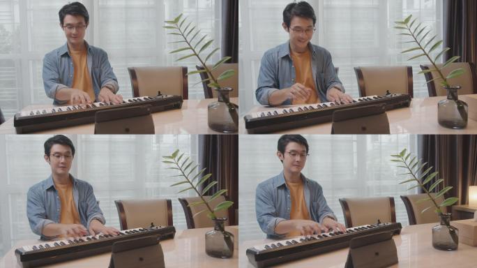 弹奏电子钢琴男人弹琴