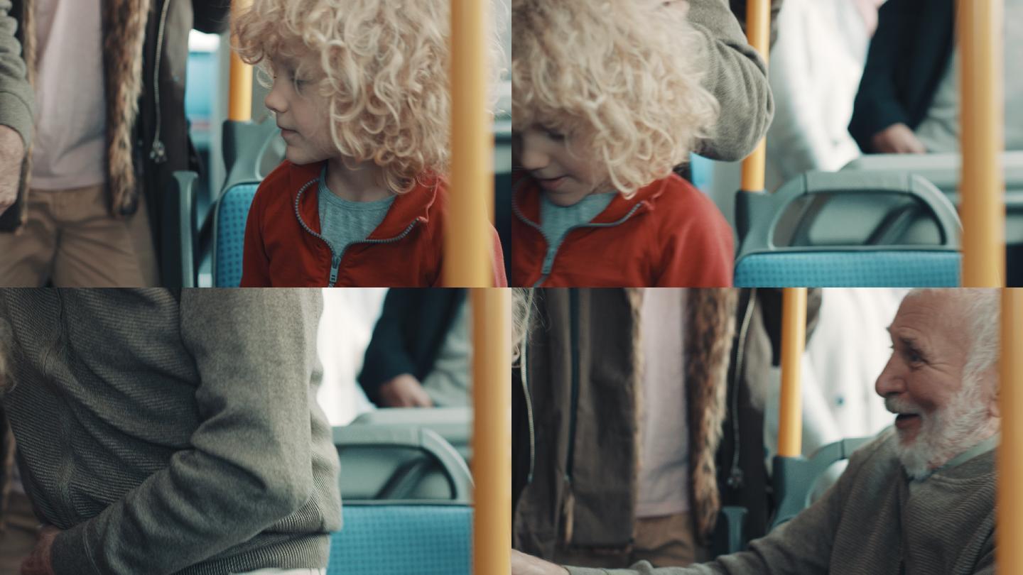 在公共汽车上给爷爷让位的男孩
