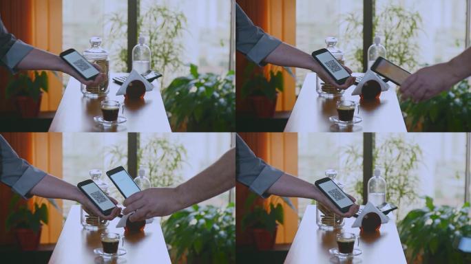 手持智能手机动态二维码阅读咖啡付款
