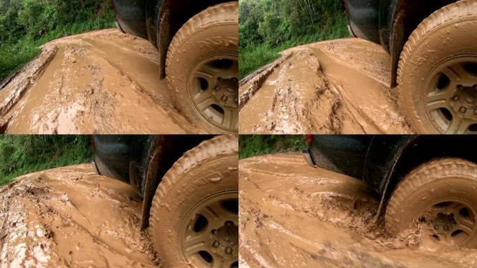 在泥泞的小路上驾驶四轮驱动汽车行驶