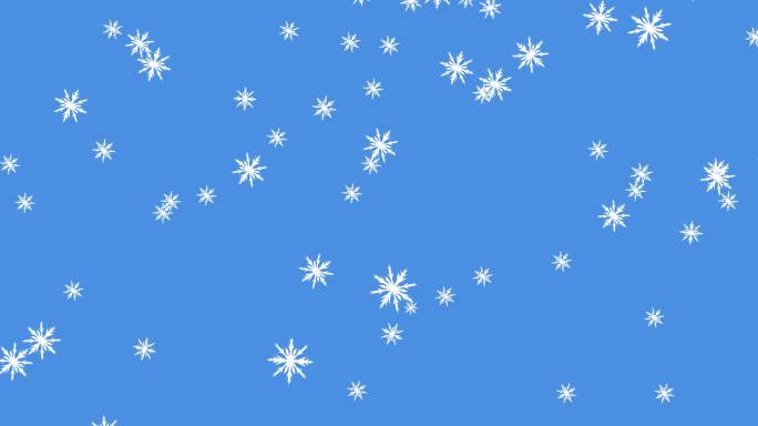 发光的雪粒子落在蓝色背景上