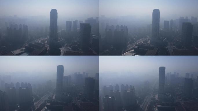 航拍雾霾天气城市建筑环绕镜头视频素材