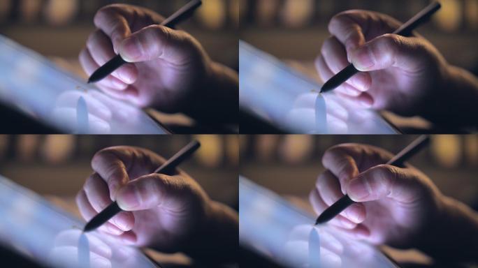 在数字平板电脑上使用数字铅笔绘制手的特写