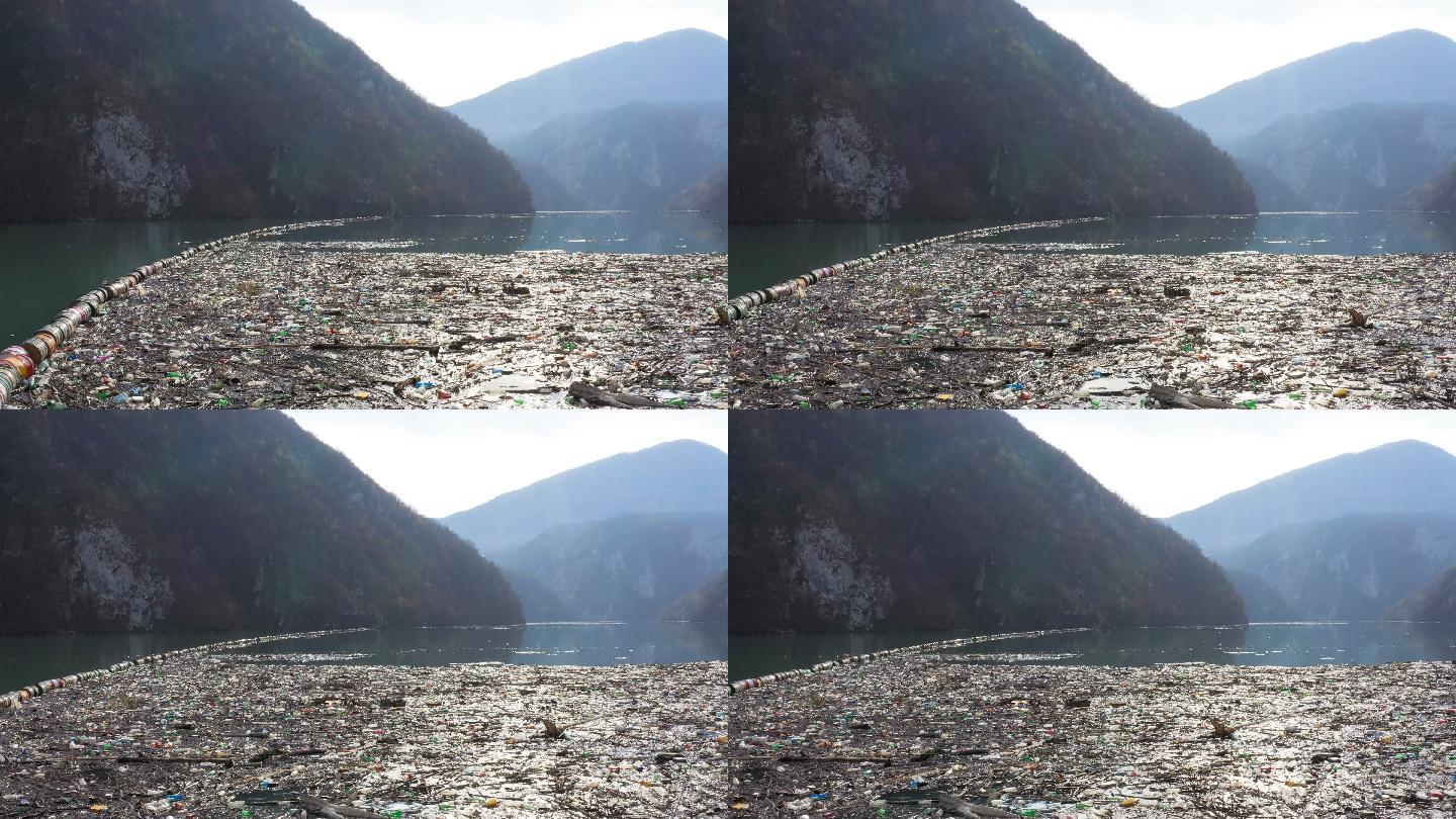 被垃圾污染的河流瓶子塑料袋回收