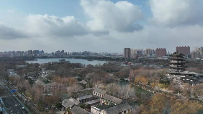 济南大明湖超然楼湖心岛冬季雪景航拍4k