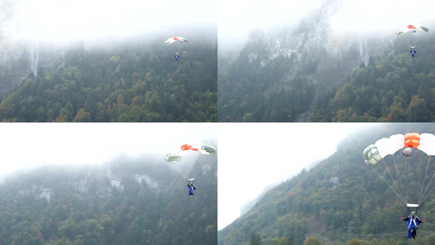 跳伞者从悬崖上降落