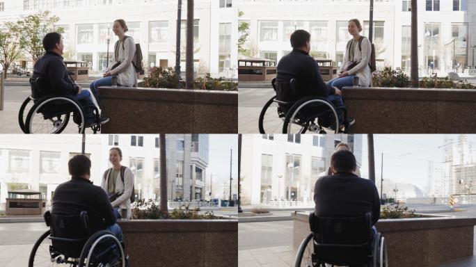 在交流的两个人残障人士坐轮椅关爱社会