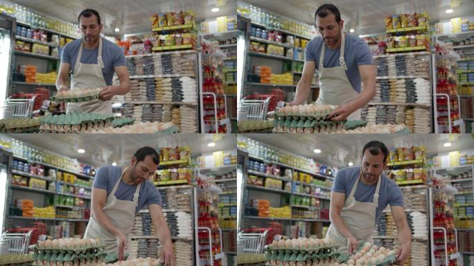 店员在摆放鸡蛋超市服务人员老板视频素材鸡