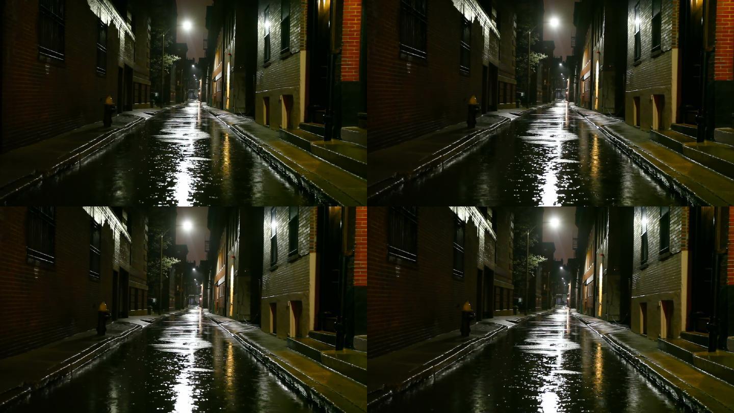 城市的雨夜黑暗道路交叉口水坑