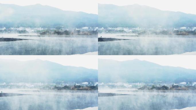 青弋江晨雾飘渺延时摄影 远山村庄河流仙境