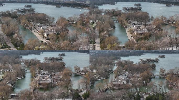 济南大明湖超然楼湖心岛冬季雪景航拍4k