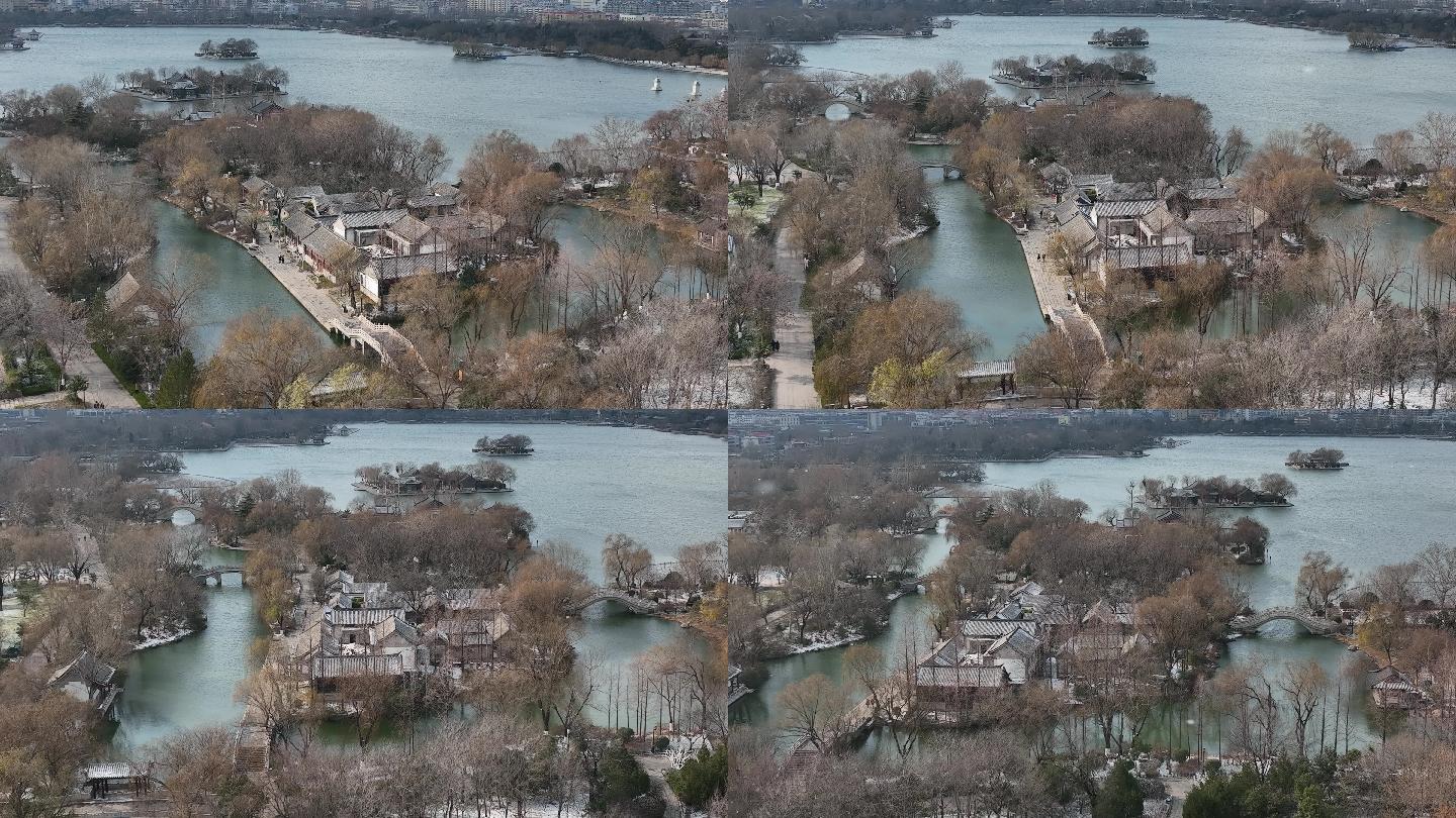 济南大明湖超然楼湖心岛冬季雪景航拍4k