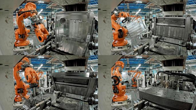 工业机器人在工厂内提升金属物体