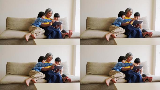 祖母给孩子们读书温馨家庭教育陪读