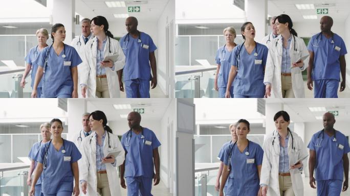 一组医护人员在医院一起散步时交谈