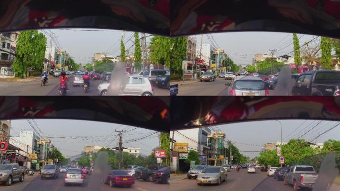乘坐三轮摩托车游览老挝首都万象