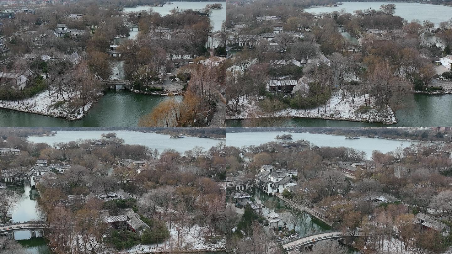 济南大明湖超然楼湖心岛冬季雪景航拍4k