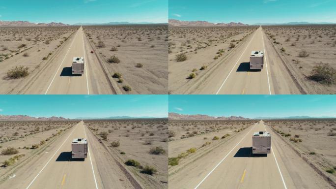 道路上行驶的汽车航拍新疆沙漠公路汽车越野