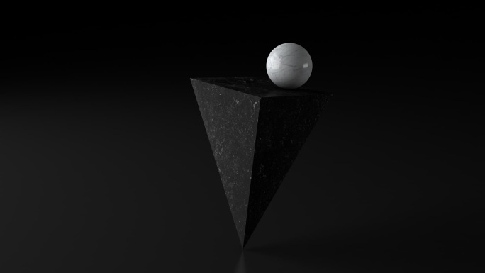 黑色大理石金字塔和白色球