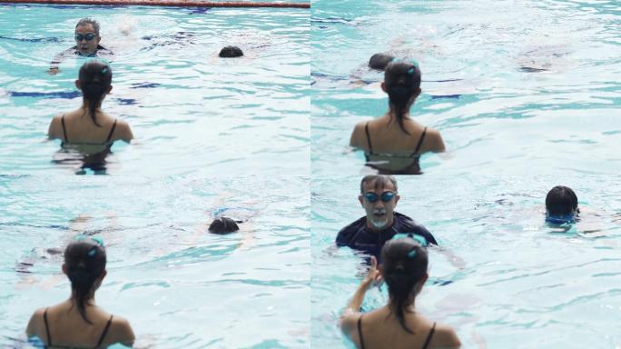 在游泳池练习游泳运动员水下憋气泳衣
