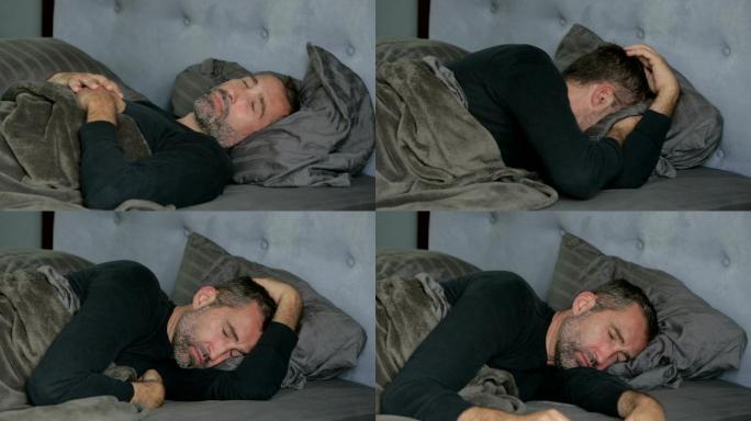 睡在床上的男人外国人新冠感染失眠