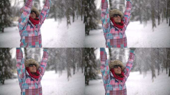 女人在雪地里玩耍雪天玩雪树林雪景国外女性