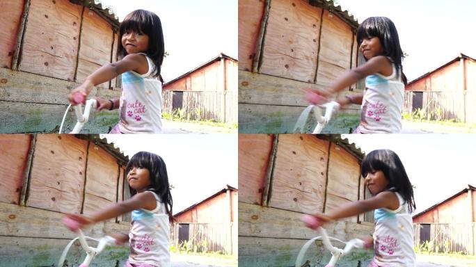 在农村骑自行车的可爱女孩画像