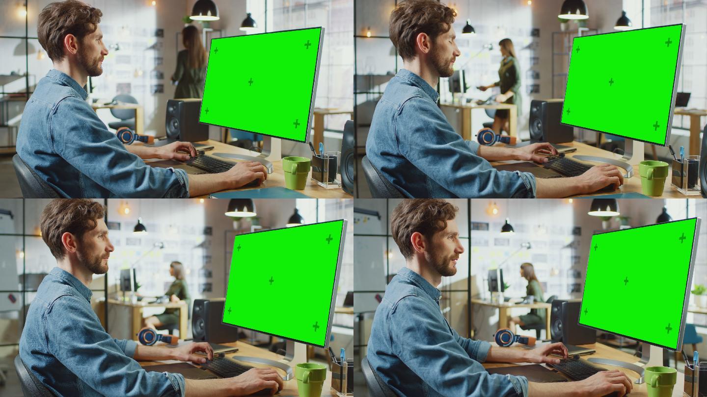 男性视频编辑在他的个人电脑上工作