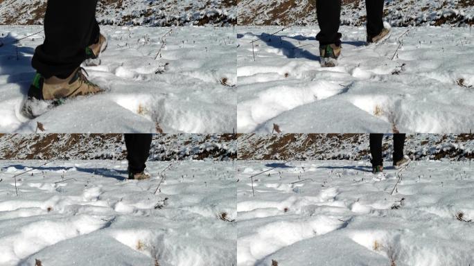 雪地里男人的脚步升格慢动作雪地里迈步