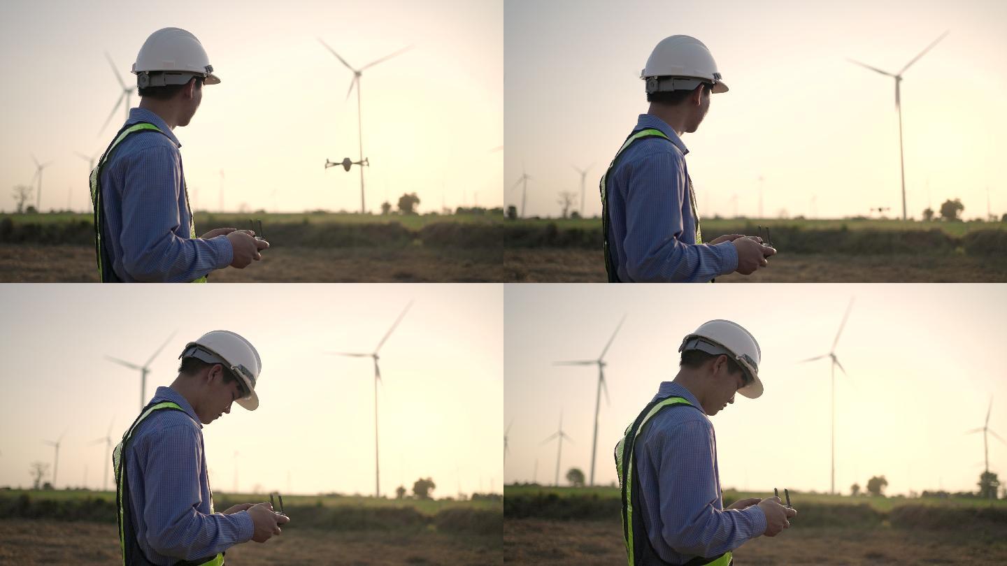 工程师控制着在风力发电站工作的无人机
