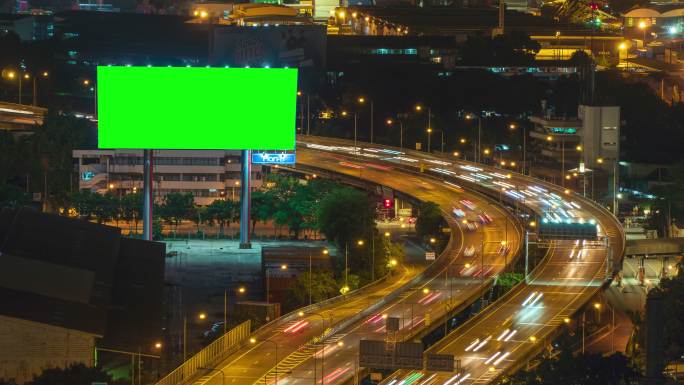 绿色屏幕的广告牌延时摄影车流夜景