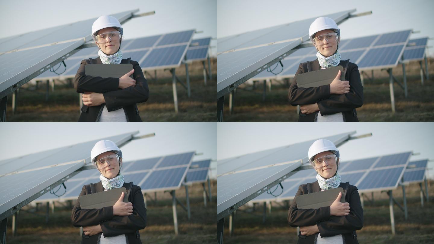 在太阳能电站现场工作的维护工程师的肖像。