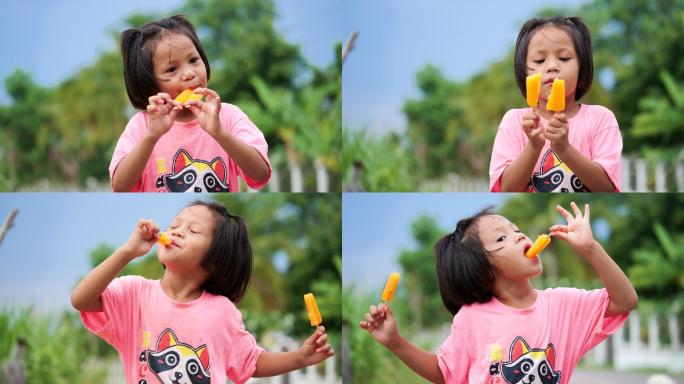 小女孩在农村吃冰淇淋。
