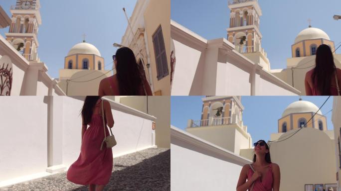一位年轻女子在希腊岛上散步